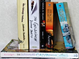 Acorna, Acorna's Quest, The Goldfinch, The Satanic Verses, the Indispensible Calvin and Hobbes